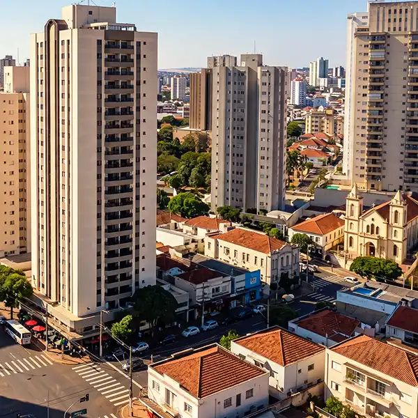 Imagem de arranha-céus modernos na cidade de Brasília, com prédios altos e sinalização de trânsito na rua. Cena urbana com edifícios residenciais e comerciais.